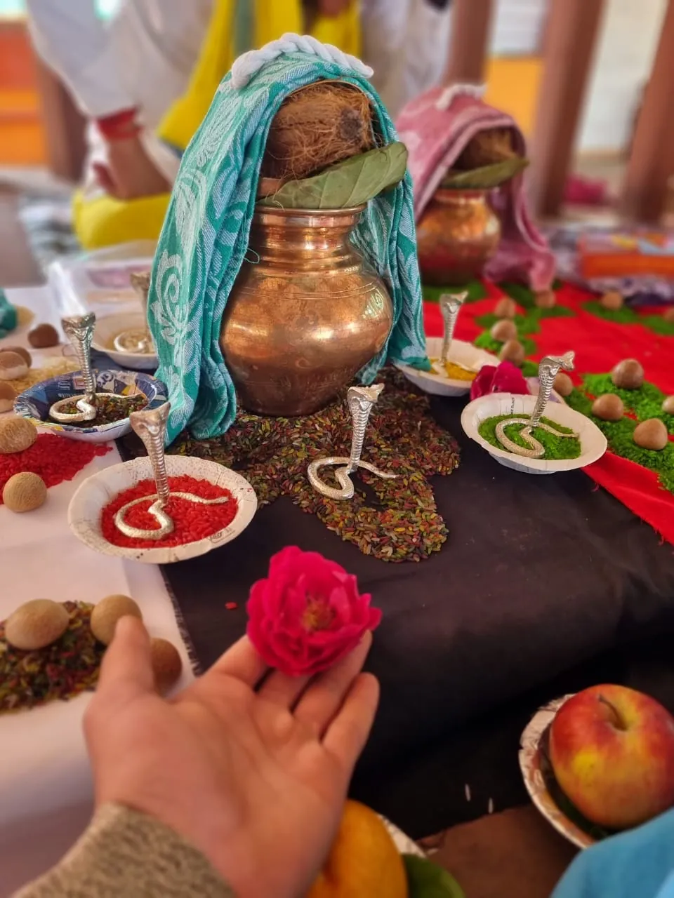 Kaal Sarp Dosh Puja setup at Trimbakeshwar with kalash, silver naag pratima and flowers