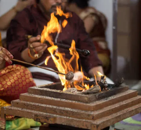 Dashansh havan with ghee ahuti in a havan kund after Mahamrityunjay Jaap