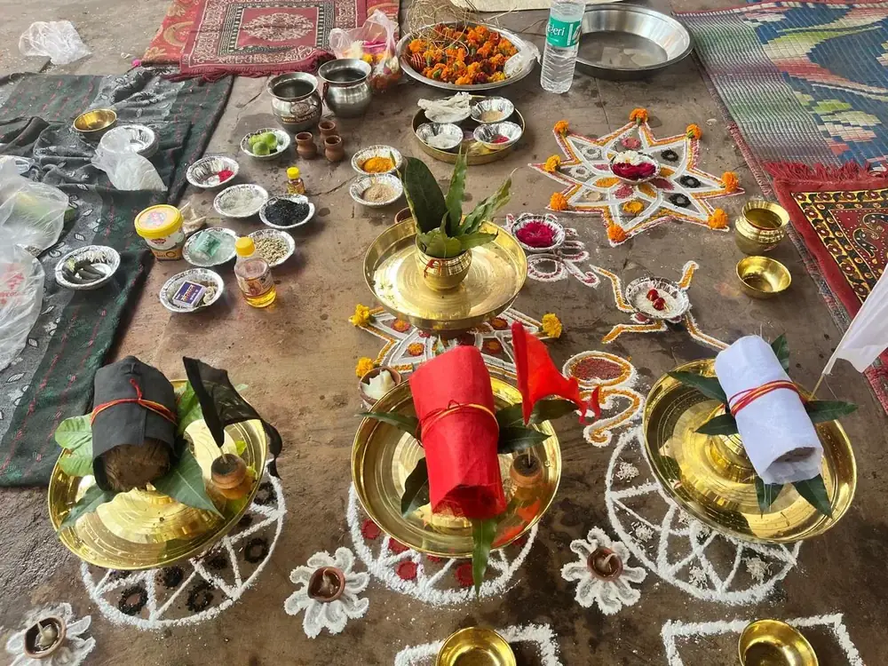 Three kalash covered in black, red and white cloth for Brahma, Vishnu and Mahesh in Tripindi Shradh